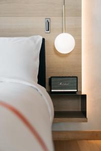 Postel nebo postele na pokoji v ubytování Ruby Emma Hotel Amsterdam