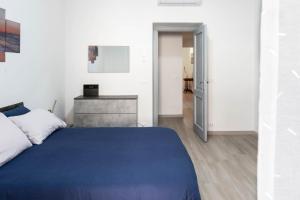 En eller flere senge i et værelse på Il Giardino Segreto