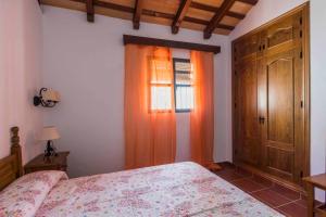 Postel nebo postele na pokoji v ubytování Vivienda Rural Atlántico Sur & Familias