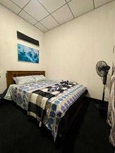 Una cama o camas en una habitación de Villa Turtle