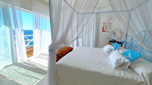 Postel nebo postele na pokoji v ubytování Dolcevita Cliff Private Resort by KlabHouse - Adults Only