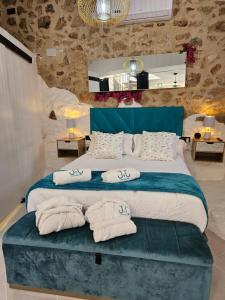 Posteľ alebo postele v izbe v ubytovaní El Edén Casas Rurales con Piscina y Jacuzzi + 37 fotografií