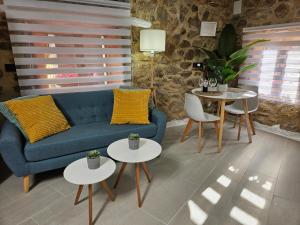 Posedenie v ubytovaní El Edén Casas Rurales con Piscina y Jacuzzi