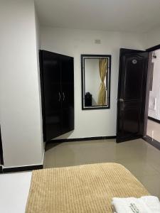 Hotel Palmeras De Mariana客房内的一张或多张床位
