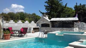 Gallery image of Apartment in Villa Tamara -Pool beheizt ,Meerblick in Škrip +20 photos