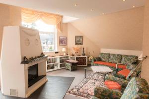 Posezení v ubytování Ferienwohnung Burg Eltz