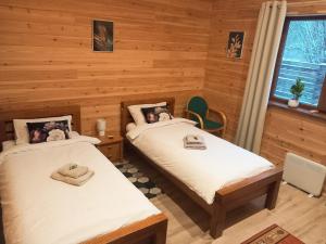 Postel nebo postele na pokoji v ubytování Forest Edge Cottage