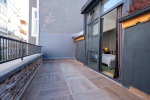 a balcony with a view of a bedroom at Private Fourlex House with Central Location in Istanbul