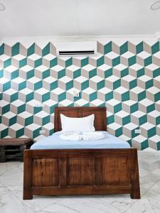 Ένα ή περισσότερα κρεβάτια σε δωμάτιο στο Hello Rafiki House - Stonetown