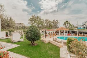 The swimming pool at or close to Iphigenia Mythic Retreat