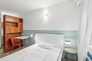 Postel nebo postele na pokoji v ubytování betahouse Self-Check In Hostel