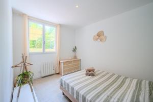 Postel nebo postele na pokoji v ubytování La Clémente
