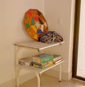 a shelf with a mirror on top of it at Villa Privada con entrada y salida 100 por ciento flexible in La Florida