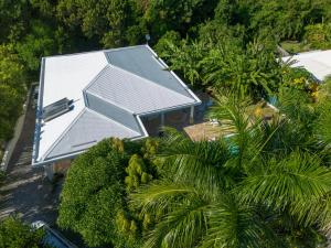 Κήπος έξω από το Villa Paradissol Cocon tropical 3 chambres avec piscine