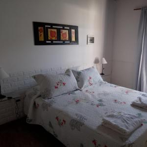 Ένα ή περισσότερα κρεβάτια σε δωμάτιο στο Apartamento los angeles