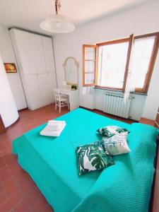 Ένα ή περισσότερα κρεβάτια σε δωμάτιο στο Casa Vacanze Versilia Mare