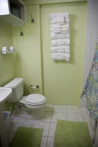 Ένα μπάνιο στο Tangerine Sunsets Alta Vista Suite 2