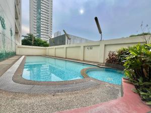 Πισίνα στο ή κοντά στο A cozy condo within the center of Manila