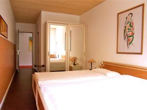 Ein Bett oder Betten in einem Zimmer der Unterkunft Hotel Pizzo Vogorno