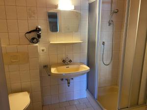 Kúpeľňa v ubytovaní Residenz am Erzbach Top 2A