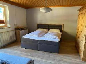 Posteľ alebo postele v izbe v ubytovaní Residenz am Erzbach Top 2A