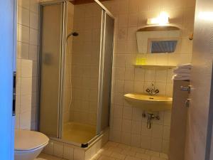 Kúpeľňa v ubytovaní Residenz am Erzbach Top 2A