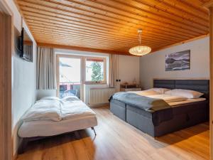 Posteľ alebo postele v izbe v ubytovaní Residenz am Erzbach Top 2A