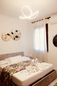 Ένα ή περισσότερα κρεβάτια σε δωμάτιο στο Private apartment in Mestre Ve