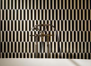a water fountain in front of a wall at Hotel Taschenbergpalais Kempinski in Dresden