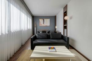 Ein Sitzbereich in der Unterkunft AC Hotel by Marriott Alicante