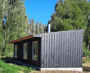 a tiny house in the middle of a forest at Los Teros in Chile Chico