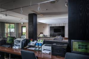 an office with a desk with computers on it at Courtyard Bangor in Bangor