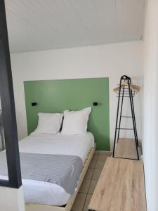 Postel nebo postele na pokoji v ubytování Appartement avec piscine