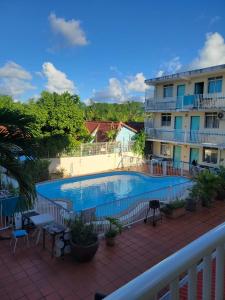 Bazén v ubytování Appartement avec piscine nebo v jeho okolí