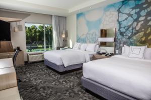 Postel nebo postele na pokoji v ubytování Courtyard by Marriott Columbia Cayce