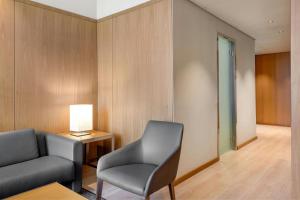 Posezení v ubytování AC Hotel Diagonal L'Illa by Marriott