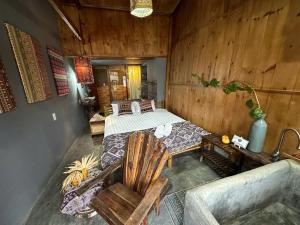 Postel nebo postele na pokoji v ubytování Hotel Làng Kò Hơ