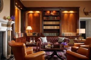 a living room with a couch and chairs and a fireplace at Mount Juliet Estate, Autograph Collection in Thomastown +139 photos