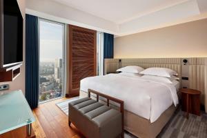 Cama ou camas em um quarto em JW Marriott Hotel Frankfurt