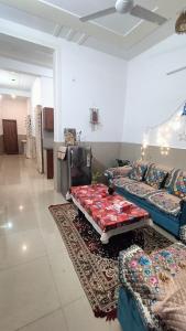 Χώρος καθιστικού στο Ganga Bliss Home