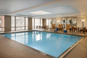 a large swimming pool in a hotel room at Courtyard Chicago Downtown/Magnificent Mile in Chicago