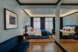 Cama ou camas em um quarto em LUME Boutique Hotel, Autograph Collection