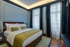 Cama ou camas em um quarto em LUME Boutique Hotel, Autograph Collection