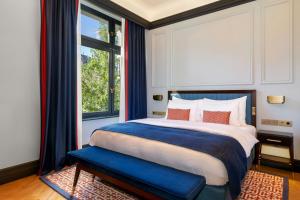 Cama ou camas em um quarto em LUME Boutique Hotel, Autograph Collection