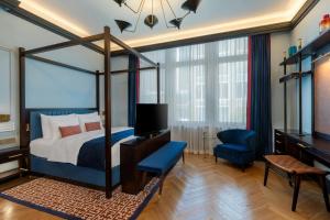 Cama ou camas em um quarto em LUME Boutique Hotel, Autograph Collection