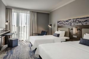 Voodi või voodid majutusasutuse Courtyard by Marriott Linz toas