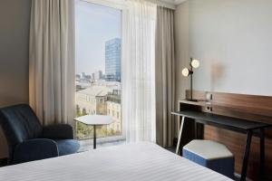 Voodi või voodid majutusasutuse Courtyard by Marriott Linz toas