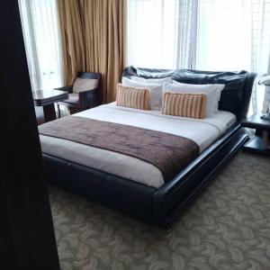 Postel nebo postele na pokoji v ubytování Fantastic appartment at times square Kuala Lumpur