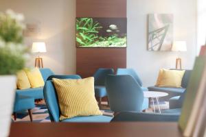 Posezení v ubytování Courtyard by Marriott Dresden