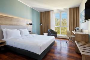 Postel nebo postele na pokoji v ubytování Courtyard by Marriott Dresden